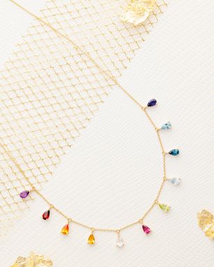 Collier or jaune et pierres fines